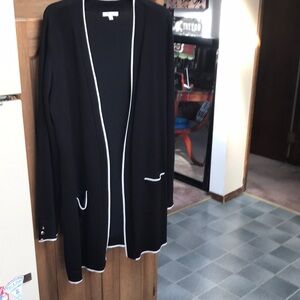 Cardigan sweater a little longer with pockets Good condition